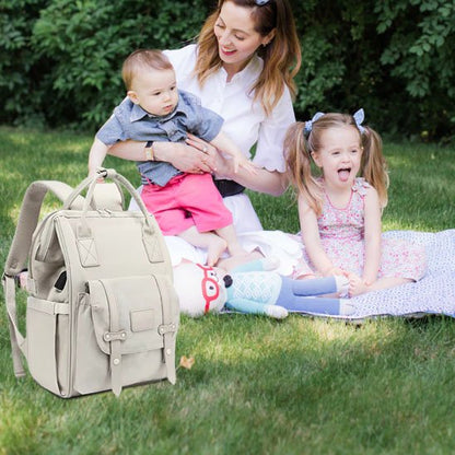 Sac a langer bebe maman et enfants dans un parc